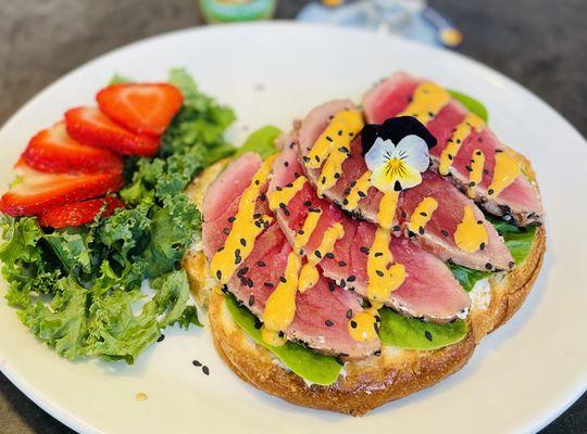 Island Spread Tartine. Cream cheese, seared tuna, spinach, spicy sauce, sesame seeds