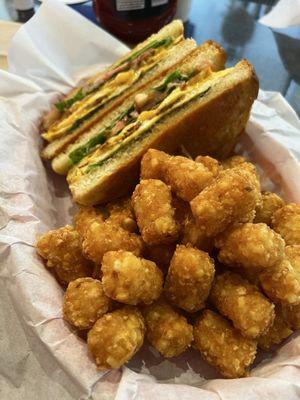 Breakfast sandwich on sourdough (chef adds crispy cheese to the bread)