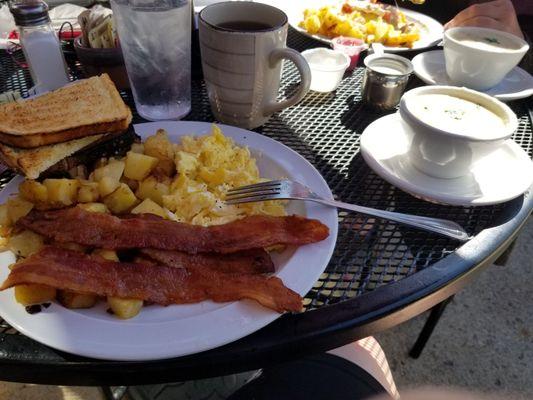 Basic breakfest with clam chowder and coffee.