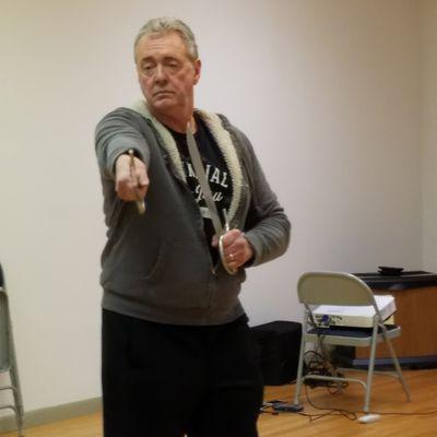 Performing the Butterfly Sword Form at a Chinese New Year celebration.