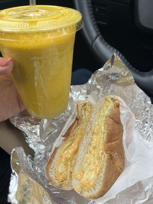 Tropical Sunrise Juice and Egg & Cheese Sandwich