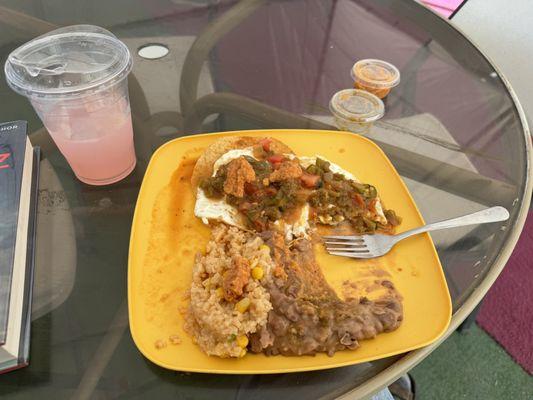 I rushed to eat ... so good. Huevos rancheros, rice, beans, two kinds of salsa. Really really good.