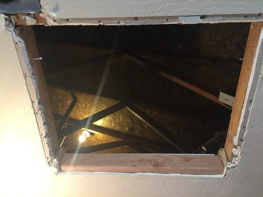 Attic access repair before picture.