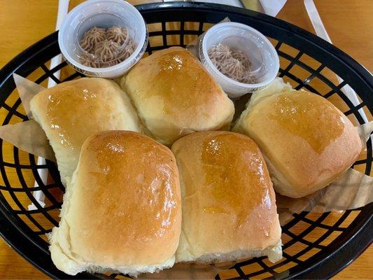 Complimentary dinner rolls with cinnamon butter.