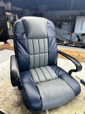 Office chair reupholstered for a competitive price l!