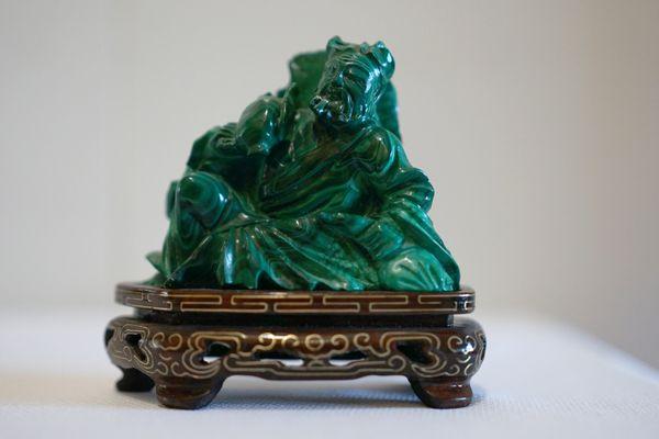 malachite that measures  3.5 inches tall by 4 inches wide.