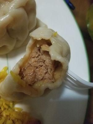 Filling of steamed pork dumpling. Pretty good, not too doughy