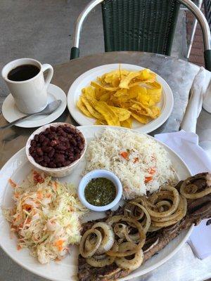 Grill beef ribs, white rice, Nicaraguan cabbage salad, red beans and plantain tajadas with black coffee.