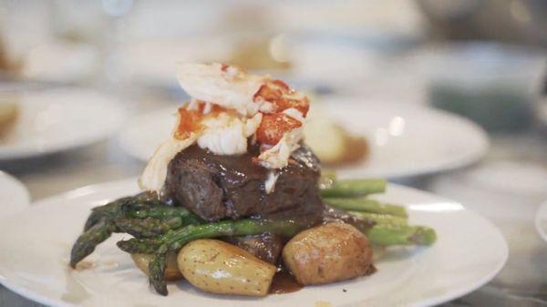 Filet and lobster with roasted potatoes and asparagus.