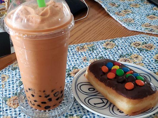 Thai tea boba and M & M doughnut.