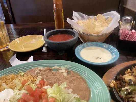 Chips salsa and cheese dip