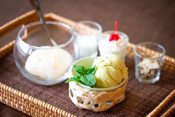 Sweet Sticky Rice with avocado ice cream, whipped cream and slice  almond