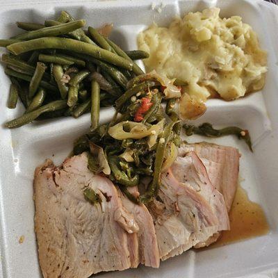 Brown sugar turkey breast with string beans, and mashed potatoes. The peppers on top added a spiciness to the sweetness of the turkey.