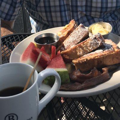 French toast with bacon and fresh fruit.