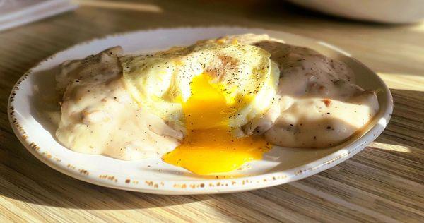 Biscuit and sausage gravy topped with a soft egg. Mmmm.