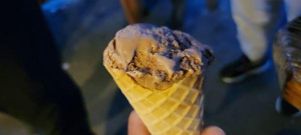 Chocolate ice cream in a waffle cone