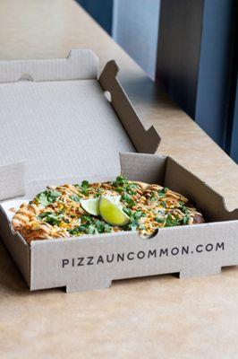 Order online at pizzauncommon.com [Pictured: Elote Pizza]