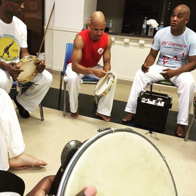 Mestre Bomba teaching us capoeira music