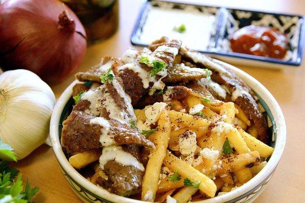 Try our Gyro fries, topped with tender Gyro strips and a hint of parsley and white sauce.