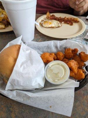 Loaded wieners with fries, side of bacon and egg. Hamburger with spicy fried cauliflower.