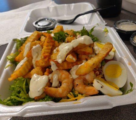 Shrimp Salad, I bought the fries on the side and put them on there.