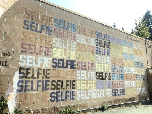 The famous selfie wall in the parking lot