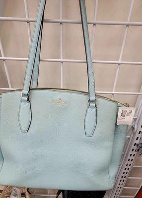 $89.99 used in just fair condition Kate Spade purse.  I see tge same in better shspe on ebay for $60.00.