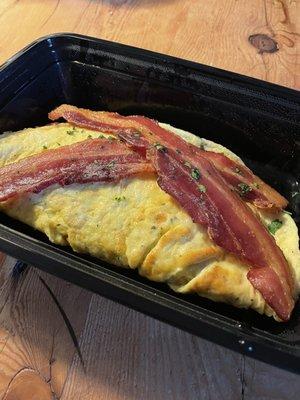 Delicious tomato, cheddar and bacon omelette delivered right to our door - so hearty!