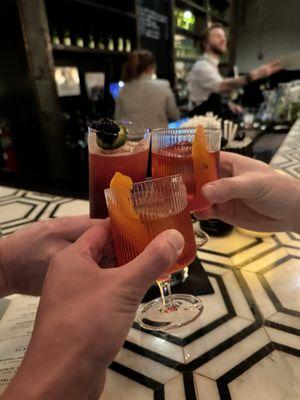 Negroni and mocktail.