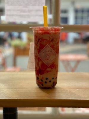 Strawberry Milk Tea with Blueberry Pearls. Light ice.