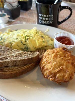 Omelette rye toast and hash brown ball