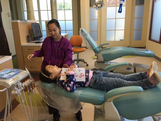 My daughter is on the autism spectrum and is SMILING in the dentist chair. Can you believe it? She used to kick & howl with our prev dentist