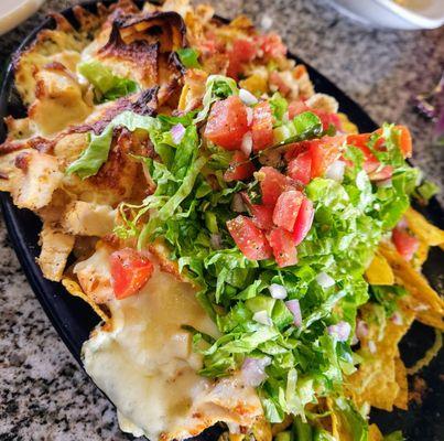 Nachos appetizer half beef and chicken