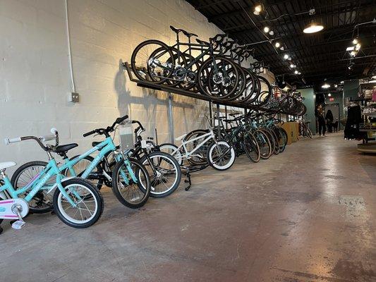 A few of our beautiful Bianchi kids bikes in the iconic celeste blue! Dont mind the beautiful Kona Rove gravel bikes in the background!