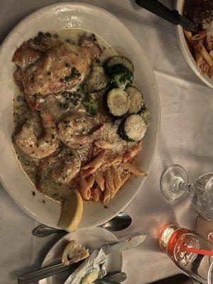 Seafood Platter with Scallops, Shrimp Scampi, Petrale Sole, Pasta, and Vegetables.