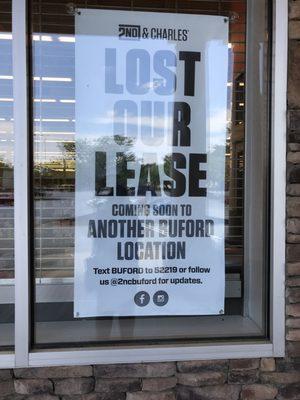 This sign was on the windows of the Buford store on May 17, 2021.