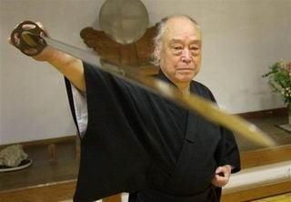 Esaka Sensei demonstrates a perfect rising cut