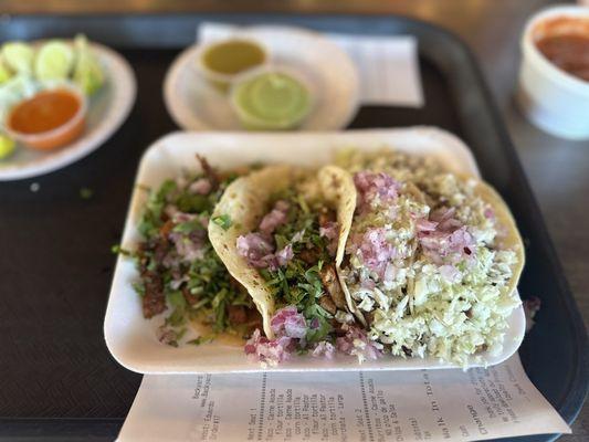 Two pastor.  Far left. Two asada on the right.   Their red spicy salsa was fire. Actually had a kick.