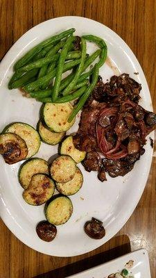 8oz fillet topped with green beans and zuchinni sides. delicious!