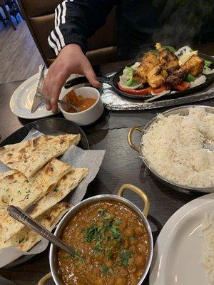 Chana Masala, tandoori salmon, garlic naan