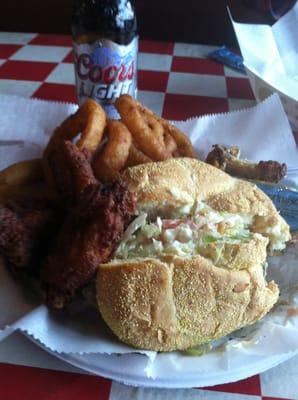 Turkey burger wit pepper jack cheese wit a side hot wings and onion rings lol