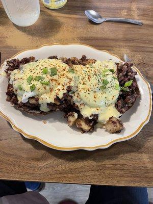 Breakfast Hash Benedict with house-made pastrami on pumpernickel bagels