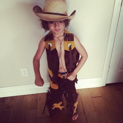 Grandson loving cowboy!