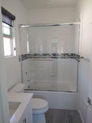 Framed sliding shower door