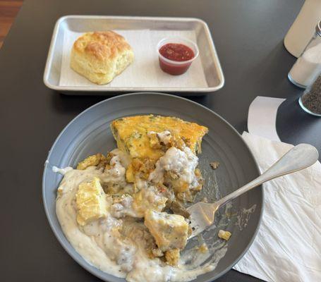 Quiche, hero-style (with extra toppings and sausage gravy) Scratch made biscuit and home made strawberry jelly