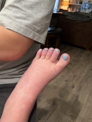 My pregnant wife with her toes painted. Feet slightly swollen from being pregnant but the nails are beautiful! :)