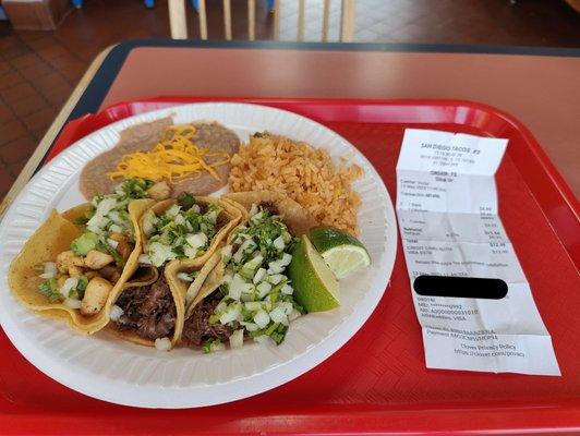 $12.49 for 3 tacos, rice and beans.