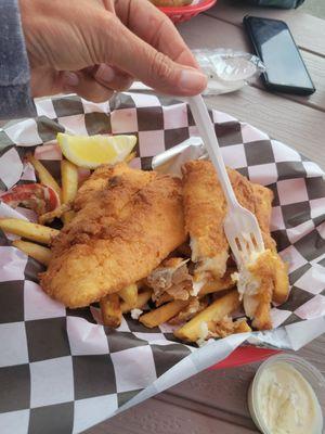 Fish and chips....such a big portion.. light and so nicely breaded..come.get it!!!