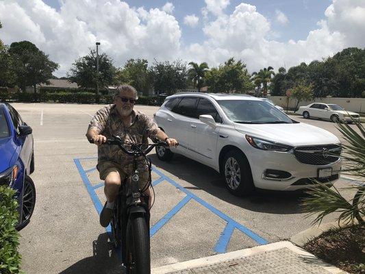 Me testing the bike outside the Electric bike shop