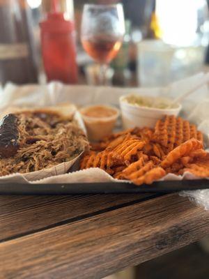 Smoked (on site with their own smoker) pulled pork, crispy sweet potatoes with angry sauce, Cole slaw, White Zinfandel